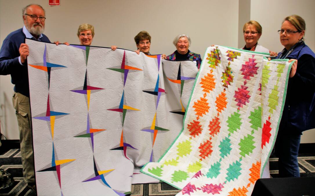 Ongoing support: The Southern Highlands Quilters Guild has 'blanketed' Welby Garden Centre in support, with these quilts to be raffled at the February 24 and 25 show. Photo: Victoria Lee