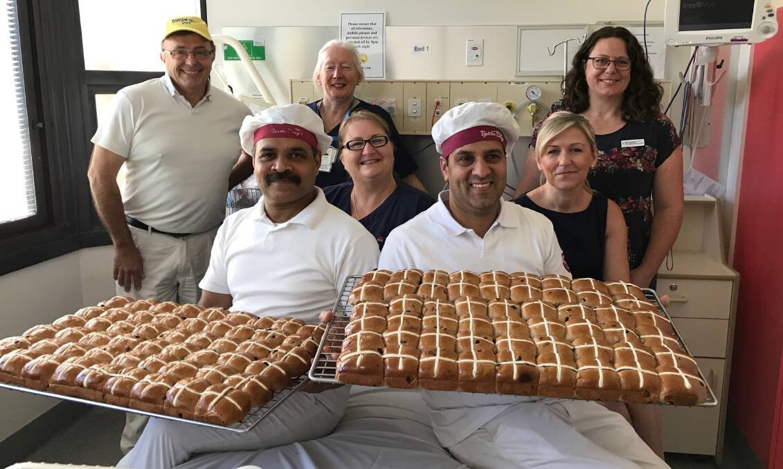 Smell the success: Bowral Hospital staff were excited to receive delicious Bakers Delight hot cross buns and a donation of more than $800. Photo: supplied.