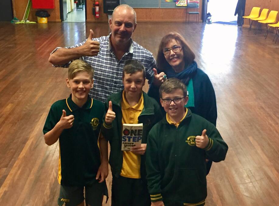 Mittagong Public School students Rowan Ferreira, Gavin Campbell and William Nickl with author Andrew Daddo and Friends of the Wingecarribee Libraries president Robyn Karakasch. Photo: Victoria Lee