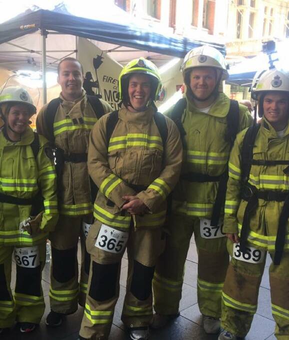 Feel the burn: Two of the Southern Scalers team members finished in the top 100 of a total 446 firefighters in the Sydney Tower Climb for Motor Neurone Disease research. Photo: supplied.