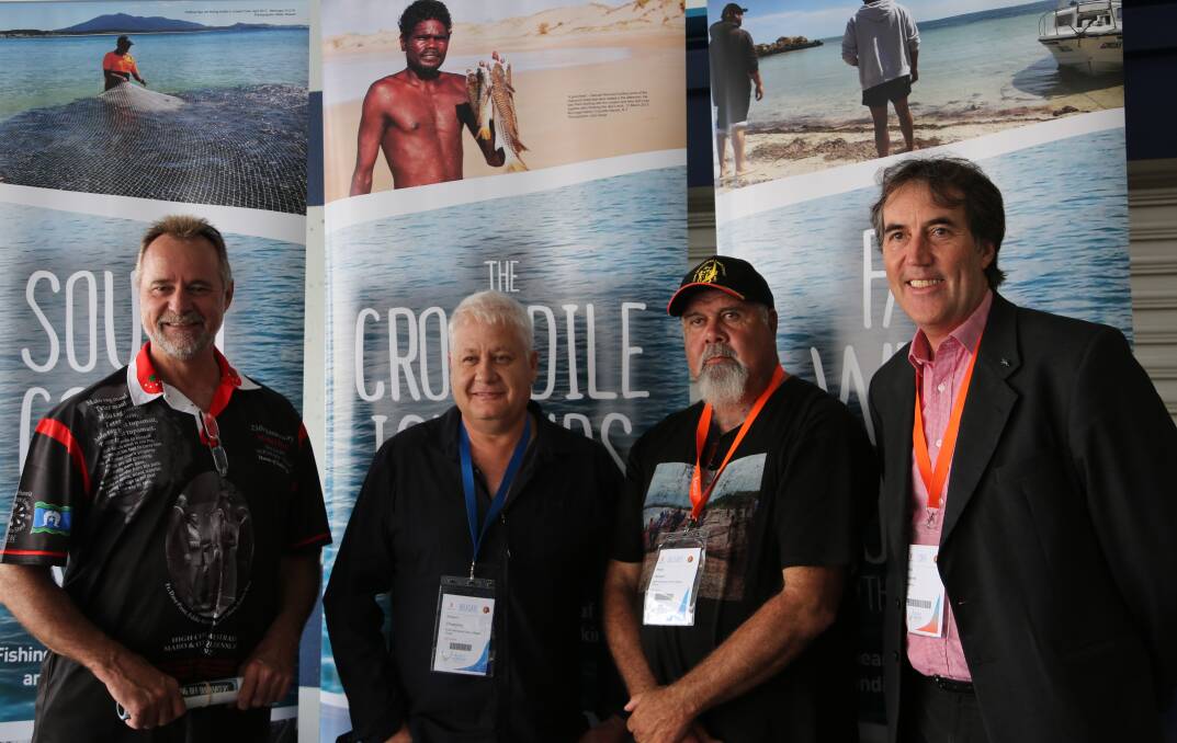 Federal Indigenous Affairs Minister Nigel Scullion, Robert Chewying and Wally Stewart from the NSW Aboriginal Fishing Rights Group and Rod Kennett, director of Native Title Research Unit at AIATSIS, at the Native Title Conference in Townsville. Photo courtesy of Australian Institute of Aboriginal and Torres Strait Islander Studies 