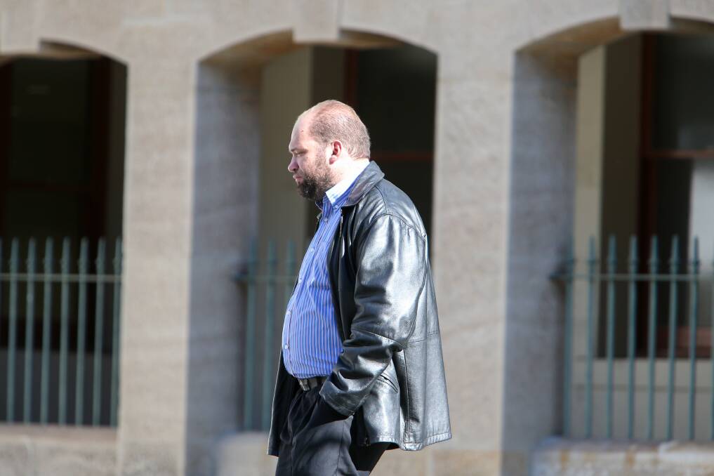 UNDER WATCH: Peter Kalantzis departs Wollongong courthouse on Thursday.