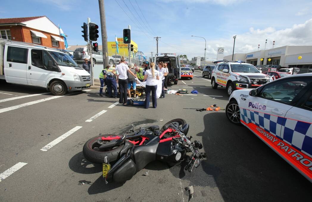 The man was thrown from his bike in the collision. Picture: Robert Peet