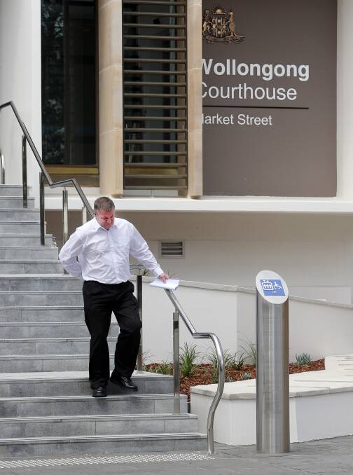 Visibly in pain, Roger Reeves departs Wollongon Courthouse on Friday. Picture: Robert Peet.