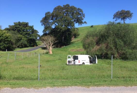 The van came unstuck on a bend on Swamp Road and went through a wire fence. 