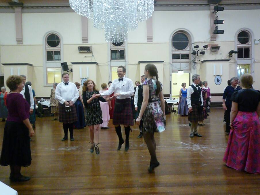 The group puts on their dancing shoes for Brigadoon.