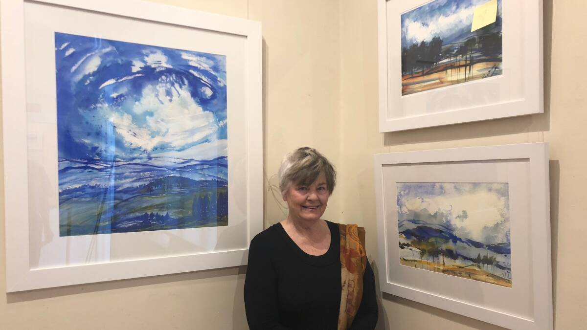five shades of blue: Moss Vale artist and mentor Jan Pooley-Hibberd is excited to showcase her latest collection of watercolours, 'Blue Moon and Highland Views,' at Bowral Art Gallery from February 21 to 29.  Photo: Brooke Gibbs