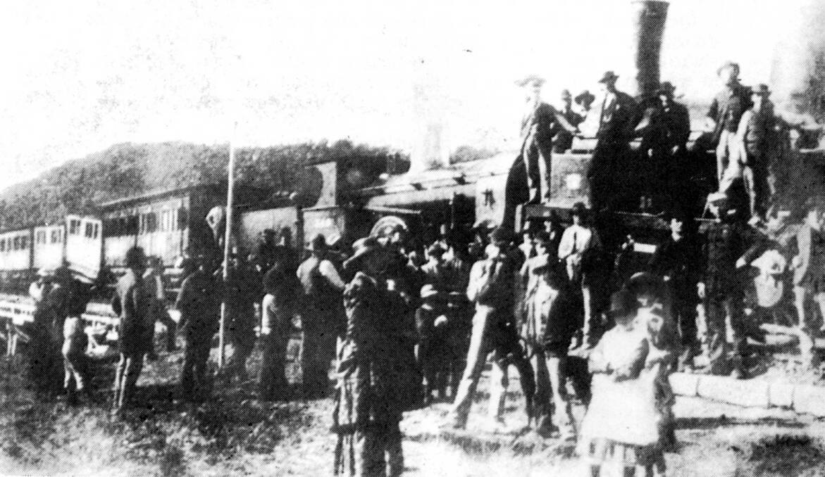 HEAD-ON SMASH: Bowral locals gather at an 1886 collision after passengers and crew were rescued. Photo: BDH&FHS