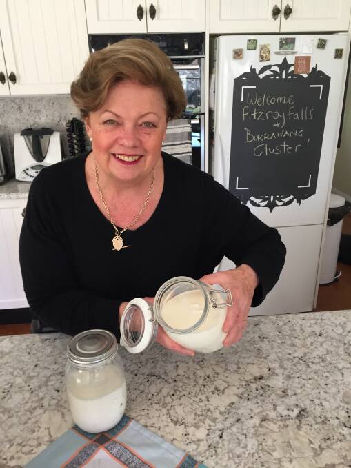 GOOD FOR ALL: Virginia Edwards, who will be conducting classes in fermented food from her Fitzroy Falls kitchen, checks on her fresh, gut-friendly keffir.