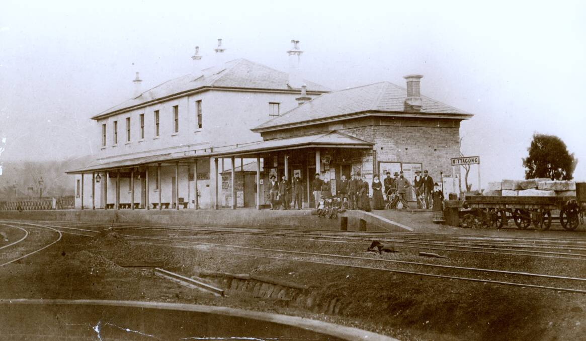 EARLY RAIL HUB: Mittagong Station, showing the Refreshment Rooms built in 1873. In foreground is the engine turntable pit and on right is an early goods railway waggon loaded with building stone blocks at the buffer stops. Note: There were no continuous brakes on waggons in early days, and what appears to be possibly a waggon wheel 'sprag' is shown lying in the foreground, (it looks like a cricket bat) that would have been used to 'sprag' waggon wheels on the siding to prevent them from rolling away down the line. Photo: BDH&FHS.