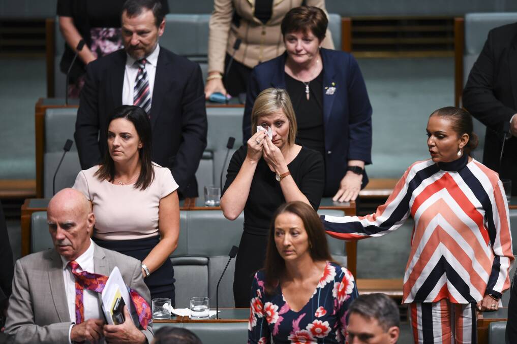 DRAGGED OUT: Labor backbench MP Susan Lamb (centre) is the latest politician to be caught up in the long-running dual citizenship saga. Photo: AAP Image/Lukas Coch