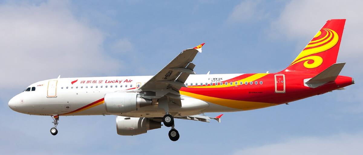 BAD THROW: Not so lucky when a passenger tossed a handful of coins towards the engine of one of this airline’s planes in eastern China. Photo: Lucky Air