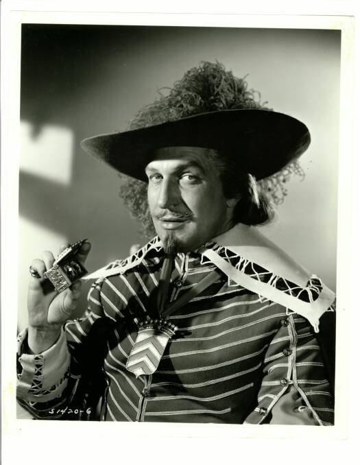 The striped enamel crest on a red ribbon worn here by Vincent Price is red and white and was worn by him in the 1948 movie The Three Musketeers. Whoever wins the bid for the crest when it goes to auction in Los Angeles in November, will get a vintage print of this publicity shot as well. (Julien’s Auctions)