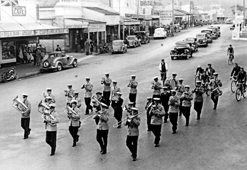 ON PARADE: Mittagong Band in 1948 at the junction of Bowral Road and Hume Highway, Mittagong. 