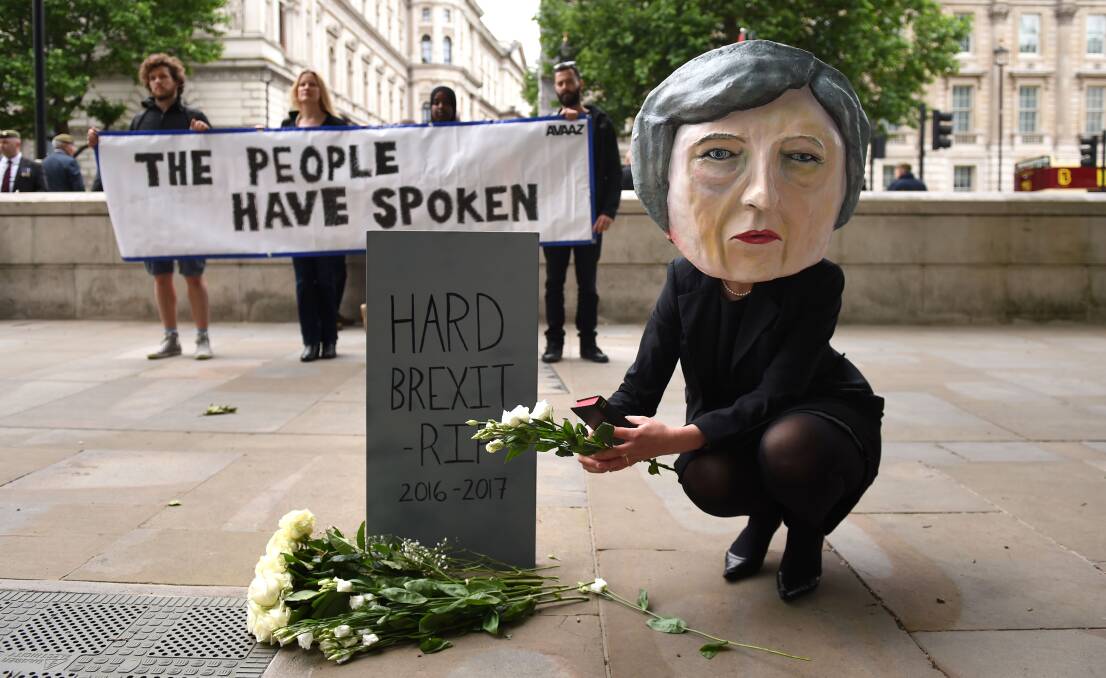 DISASTER: Protesters mock British PM Theresa May, who is paying the price for her arrogance, and Britain itself is a mess. Photo: David Merzoeff/PA Wire.
