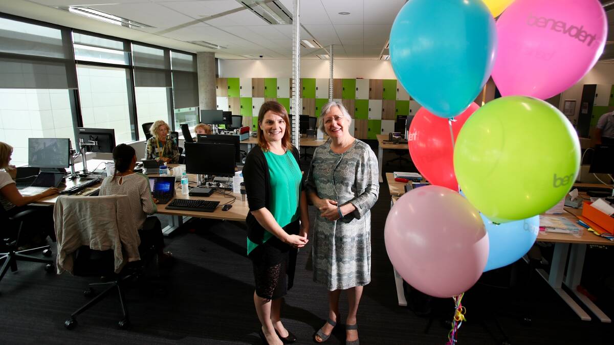 PARTY TIME: Tina McManus and Irene Maya from The Benevolent Society were on hand to officially open the charity's office at the Innovation Campus on Squires Way in North Wollongong. Picture: Adam Mclean