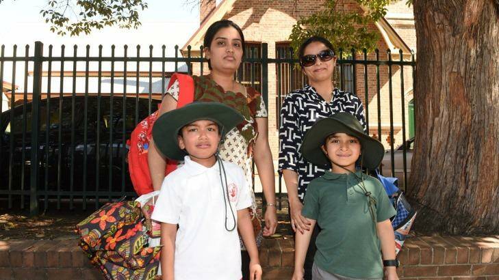Mothers Deephi Devineni and Shaheen Lalani with their sons who attend Parramatta Public School.
 Photo: Steven Siewert