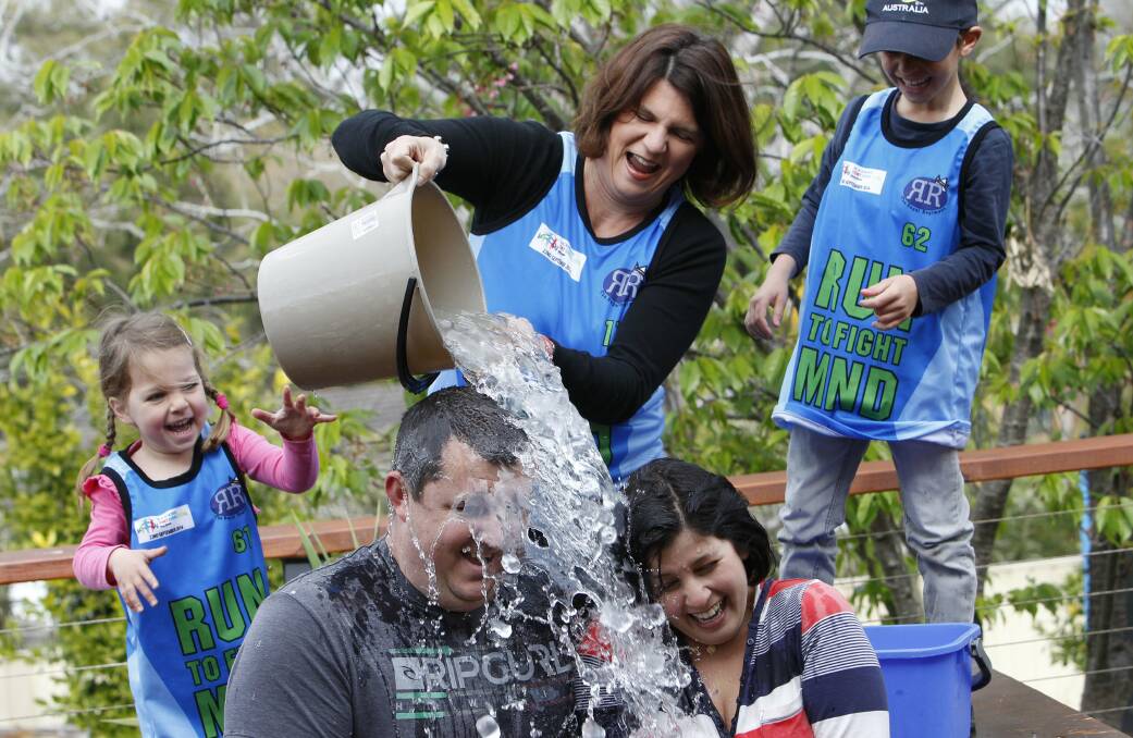 Adam's sister Renee pours icy cold water over the Regals. Picture: ANDY ZAKELI