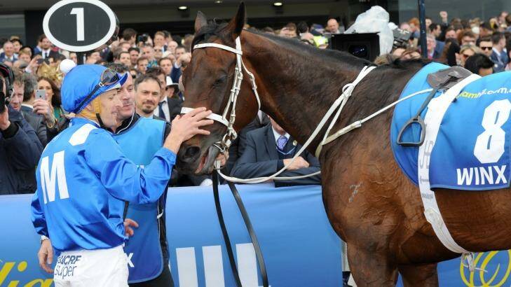 Third-best galloper on the planet: Winx and jockey Hugh Bowman after winning Cox Plate at Moonee Valley in October 2016. Photo: Vince Caligiuri