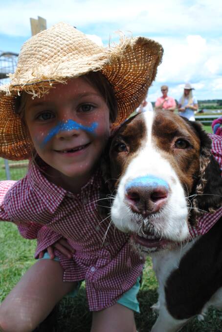 Fairlie Pulbrook and her springer spaniel Walter's matching blue noses scored them second place in the look-alike category in the Pet Show at the Bowral Show. 	Photo by Emma Biscoe