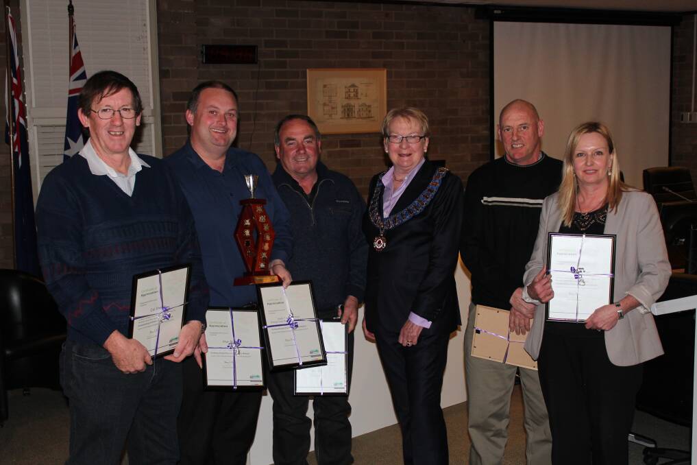 Outstanding Customer Service or Initiative Team Award winners Col Sheedy, Alan Butler, David Henderson, Noel Bromfield and Therese Smart with Mayor Juliet Arkwright. Absent: Jon Hook, Max Furphy and Gary Cox.  
	Photo supplied