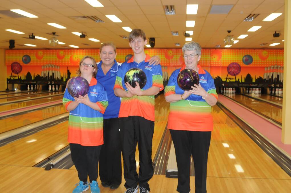 Highlanders Kelsie Waters, Aidan Ellis and Cherrie Isbister, with coach Diane McAusland, are competing at the Special Olympics National Games this week. 															          Photo by Lauren Strode