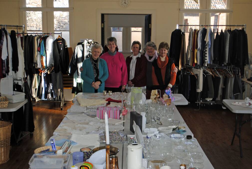 Joan Saunderson, Sandra Boggs, Eileen Smyth, June Blair and Noeline Munro, all of Bowral, at the monthly pop-up op shop at St Andrew's Presbyterian Church. Photo Ainsleigh Sheridan