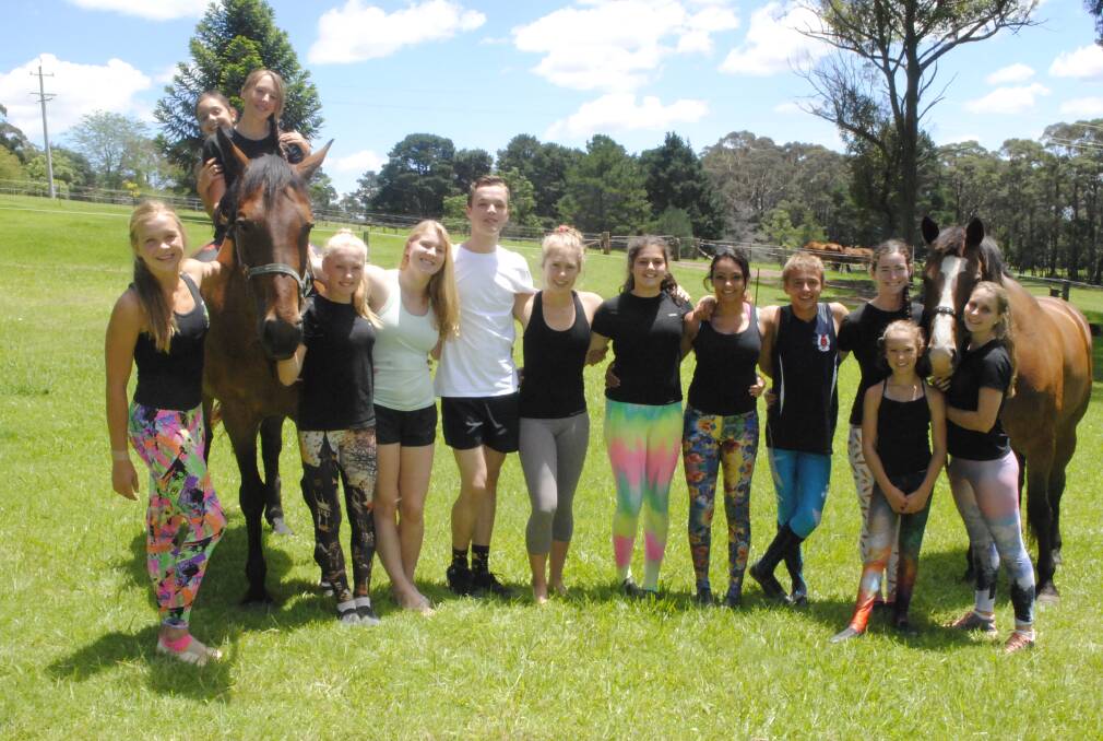 Vaulting athletes pose for a photo at a junior team intensive camp in Alpine.