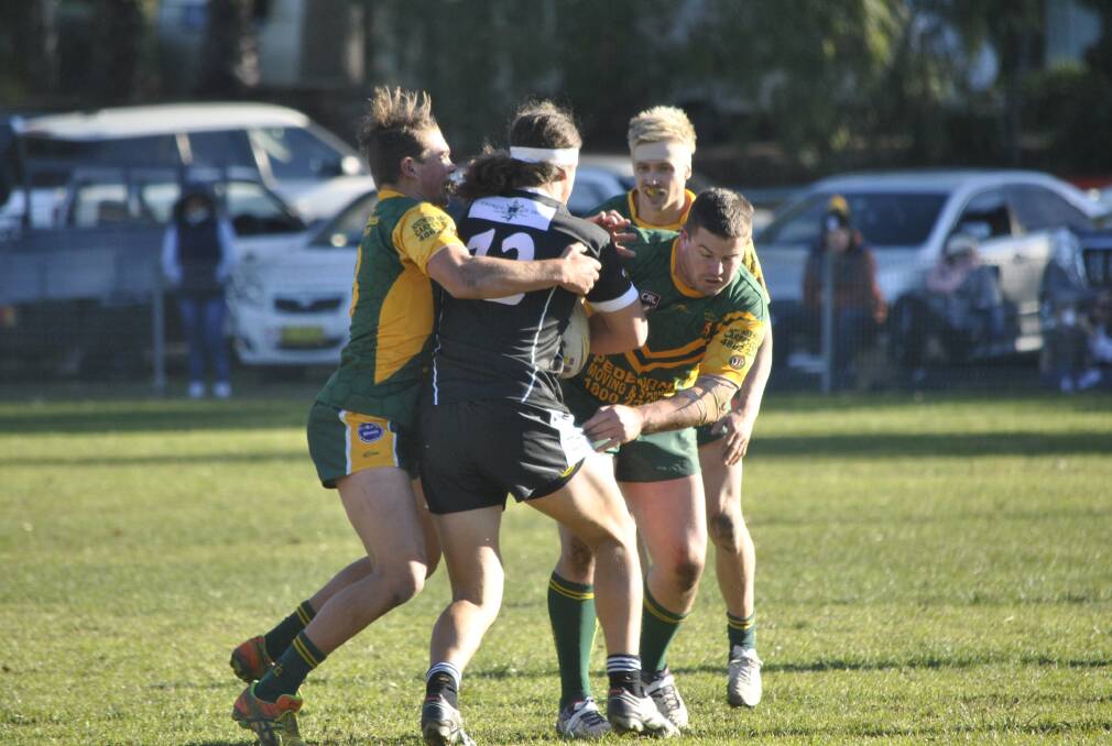 Jesse Elliott (right) combines with a Mittagong team mate in defence recently. 		   Photo by Josh Bartlett