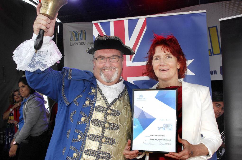 Ruth Hartcher-O Brien with town cryer Ewan Campbell at Australia Day at Liverpool Woodward Park. 	Photo by Michael Szabath