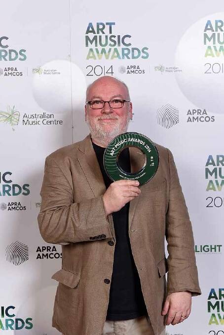 Andrew Ford proudly holds up his Work of the Year Vocal/Choral award at the Art Music Awards. Photo: Martin Philbey