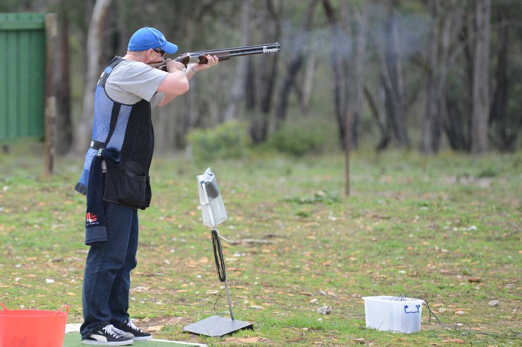 Smoke flies as Terry Senior competes in a shoot-off. 
 
Photos by Roy Truscott