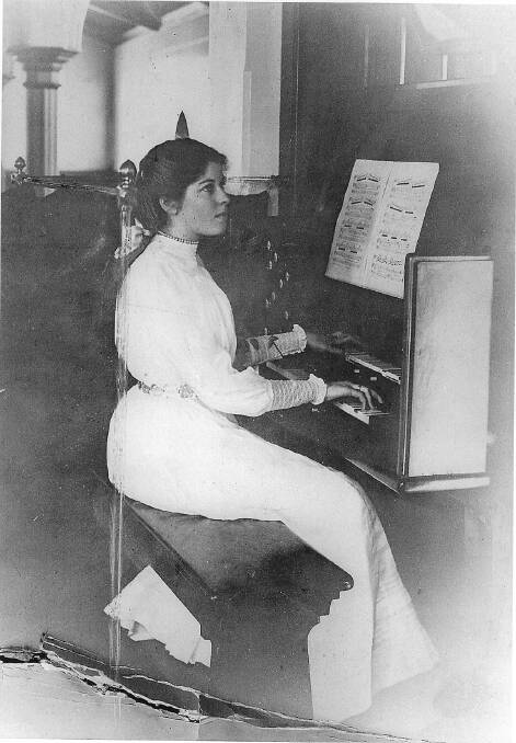 GRACEFUL: Gladys Lee (nee Stokes) playing the organ at St Judes in Bowral, 1920s.