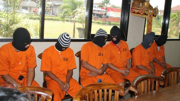 A group of men, including Schapelle Corby's boyfriend Ben Panangian, who were arrested on drugs charges. Panangian is No.99. Photo: Bali Police
