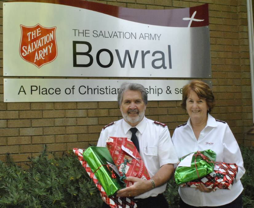 Graham and Christine Longbottom of the Salvation Army, Bowral with gifts already donated for Christmas. Photo by Emma Biscoe