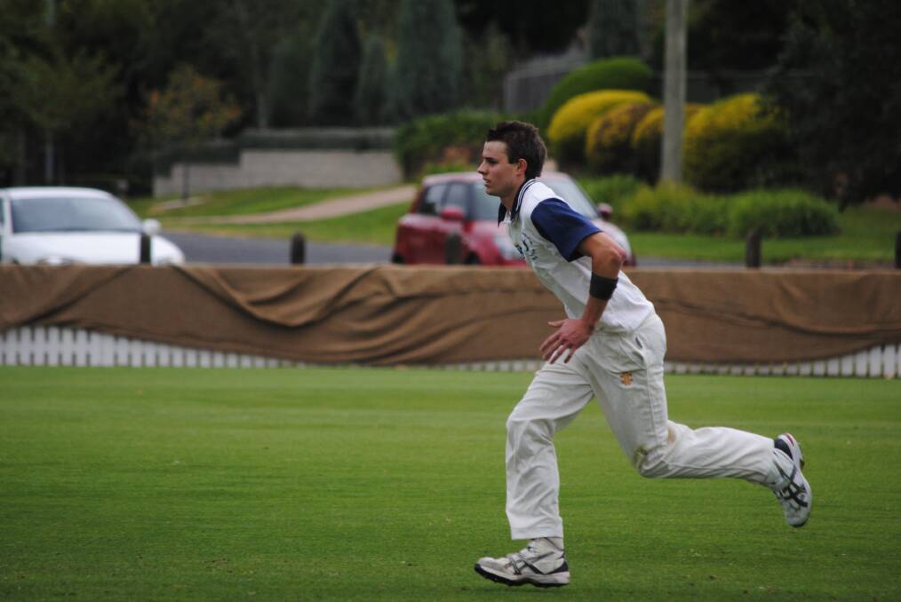 Robertson/Burrawang paceman Mitch Wright charges in on Saturday. Wright will be crucial for his team's fortunes in the grand final. Photo by Josh Bartlett
