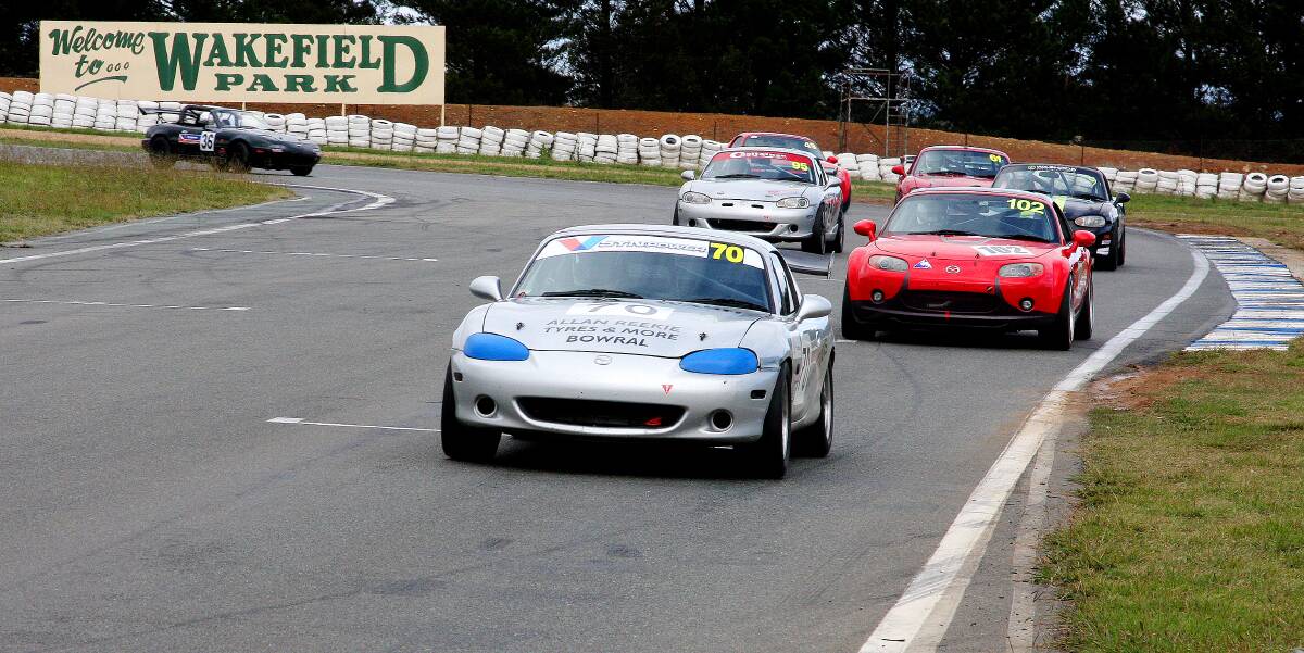 Andy Harris leads the MX5 Cup field during a race recently at Wakefield Park. 	        Photo by Craig Durrant