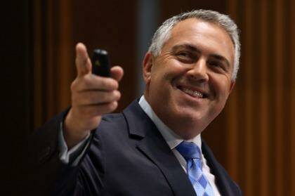 Treasurer Joe Hockey says the government "has never put a date" on returning the budget to surplus. Photo: Andrew Meares