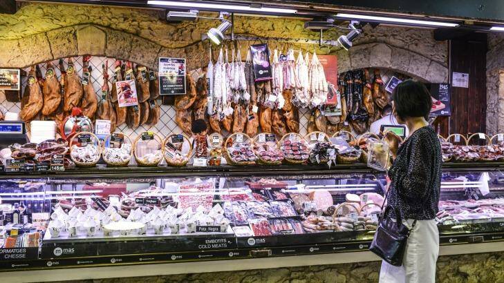 Sausages and ham for sale at La Boqueria Market, Barcelona.  Photo: Anna Bryukhanova