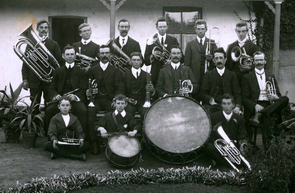 MUSIC MAKERS: Bowral Brass Band at Farm Homes Mittagong, 1908, with young Claude Lee (back, 2nd left). 