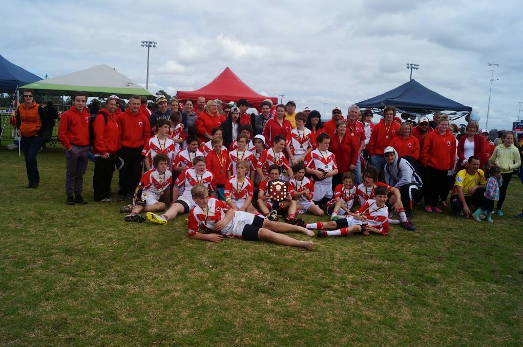 Moss Vale under-13 Dragons won the 2014 premiership with a 12-4 victory over Bowral on Saturday. Photo supplied