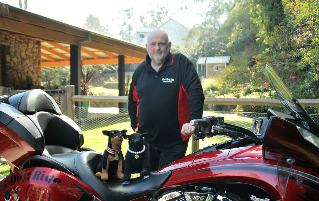 Sam Webb with Victory Vision bike and mascots "Winston" and "Clementine". Mr Webb and his wife Vanessa are taking part in the Black Dog Ride. Photo by Ash Mumford