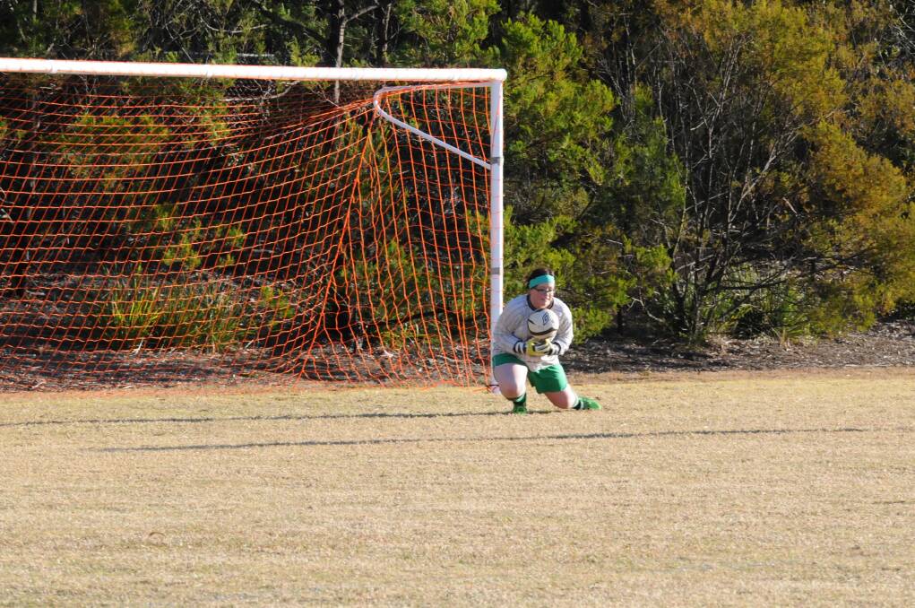 Laura Fredericks makes save for Hill Top in Saturday's match against Yerrinbool.  Photo by Lauren Strode