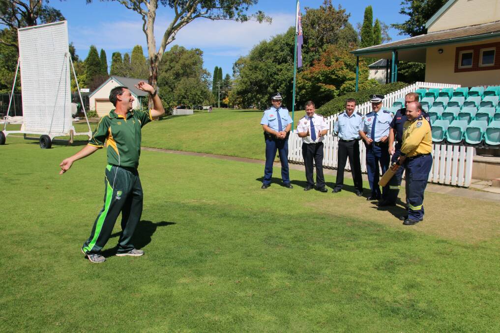Bradman Centre cricket officer Jock McIllhatton tests out the skills of local Highlands emergency services teams before the big Triple Zero Challenge this month. Photo by Victoria Lee