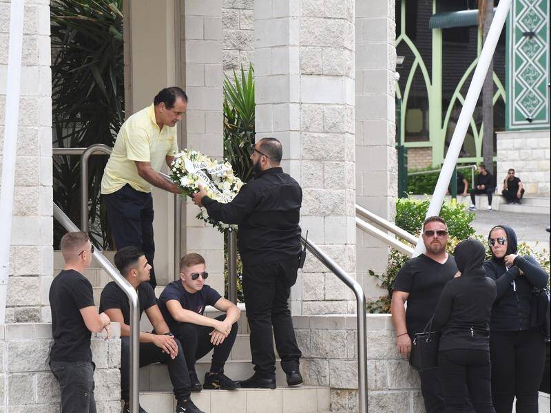 Mourners have gathered in Sydney for the funeral of slain bikie boss Mick Hawi.