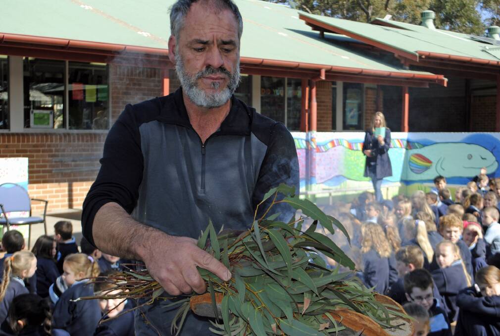 Uncle Peter performed a smoking ceremony for the public school, and played the digeridoo. Photo Ainsleigh Sheridan