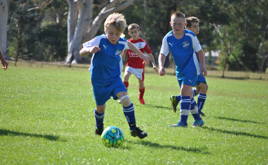 Under-10 player George Lewis in action for the Southern Branch club. Photo supplied