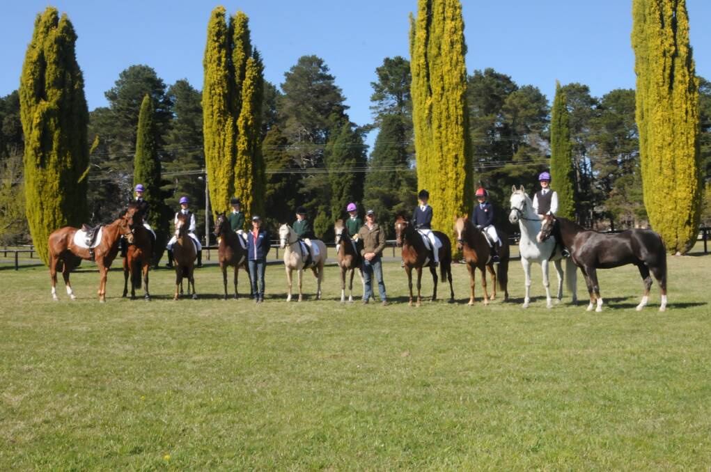 Highlands riders Olivia Inglis, Amelia Douglass, Hunter Taylor, Elizabeth Taylor, Alexandra Inglis, Amelia O'Sullivan, Rupert Douglass and Antoinette Inglis with coaches Danielle Govier and David McKinnon will compete at the Inrer-School National Championships. Photo by Lauren Strode