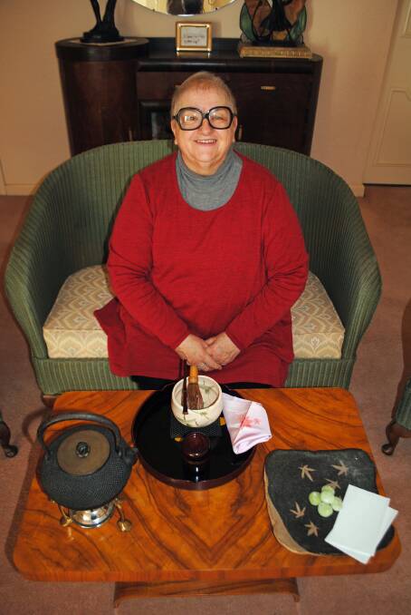 Div Williams at home with the Bonryakudemae tea set she will use for Destination Southern Highlands' Biggest Morning Tea this Thursday. Photo: Ainsleigh Sheridan