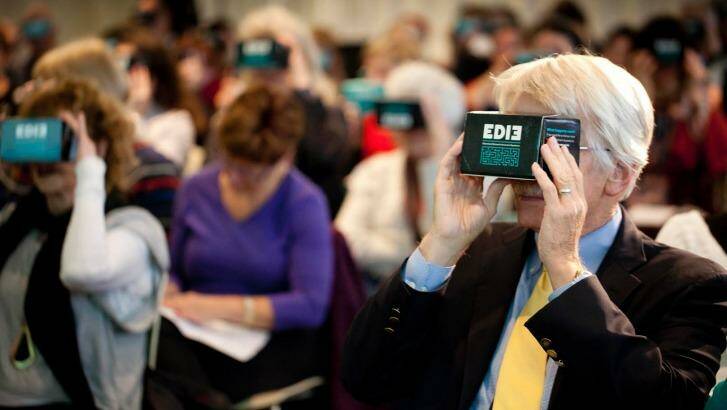 Dr Ron Petersen from the Mayo Clinic in the US tries out the EDIE app at the launch event. Photo: Arsineh Houspian